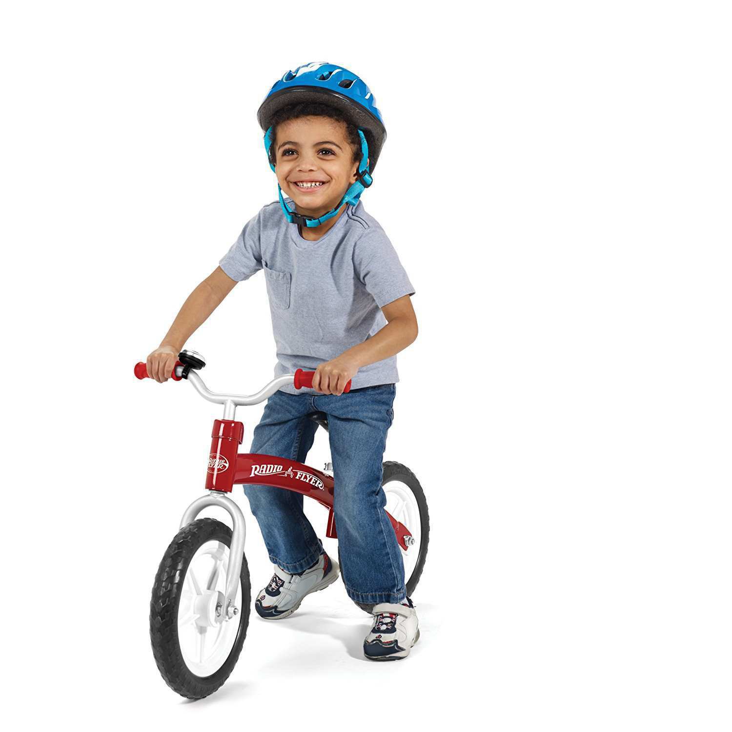 Bicicleta sin pedales Radio Flyer con niño